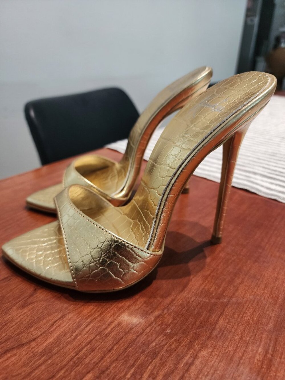 Gold stiletto designer shoes